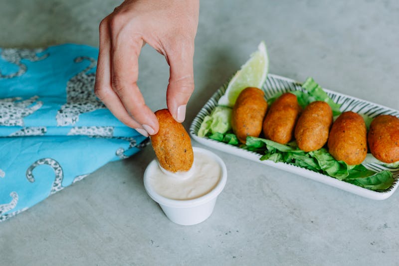 Boneless chicken bites with dipping sauces